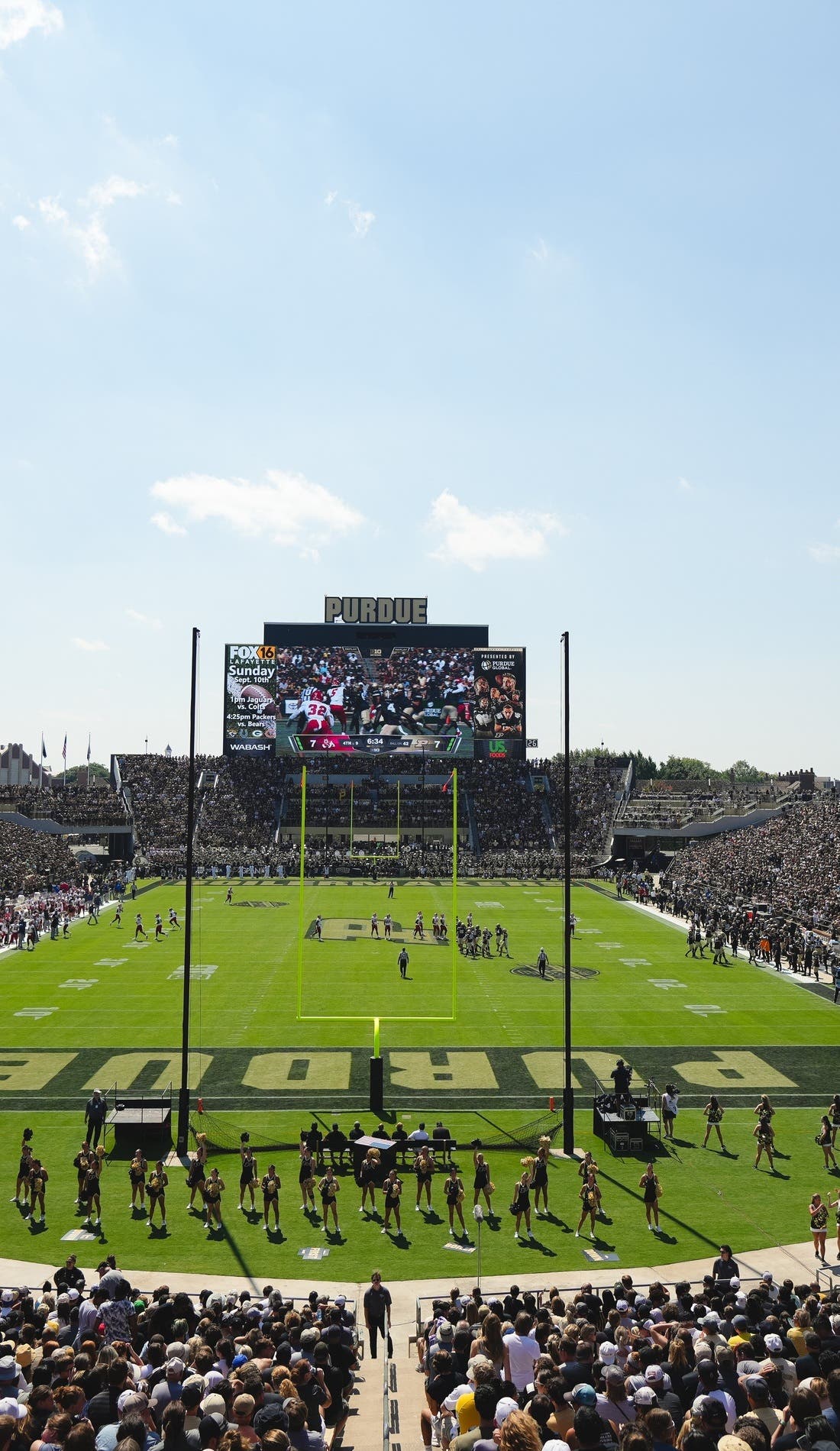 View from a seat at a Purdue Boilermakers Football vs Nevada Wolf Pack Football game, showing the teams playing