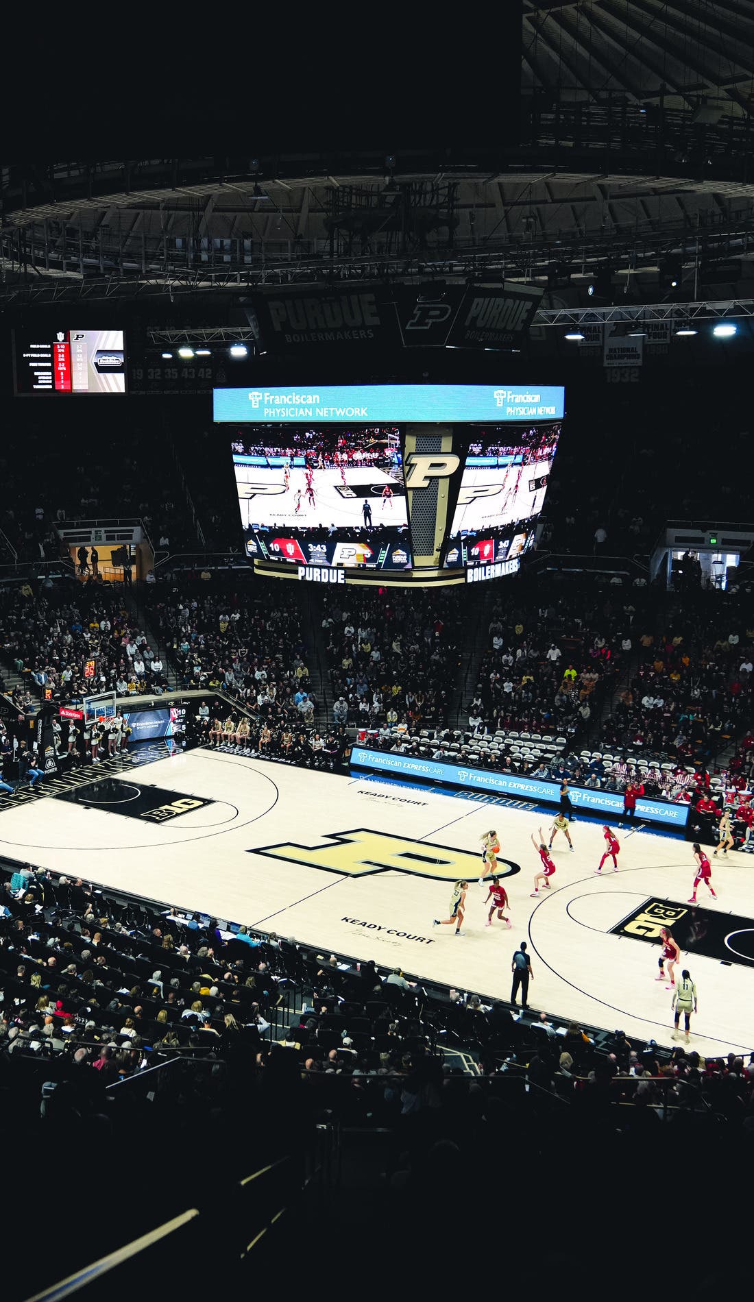 View from a seat at a Purdue Boilermakers Womens Basketball vs Indiana Hoosiers Womens Basketball game, showing the teams playing