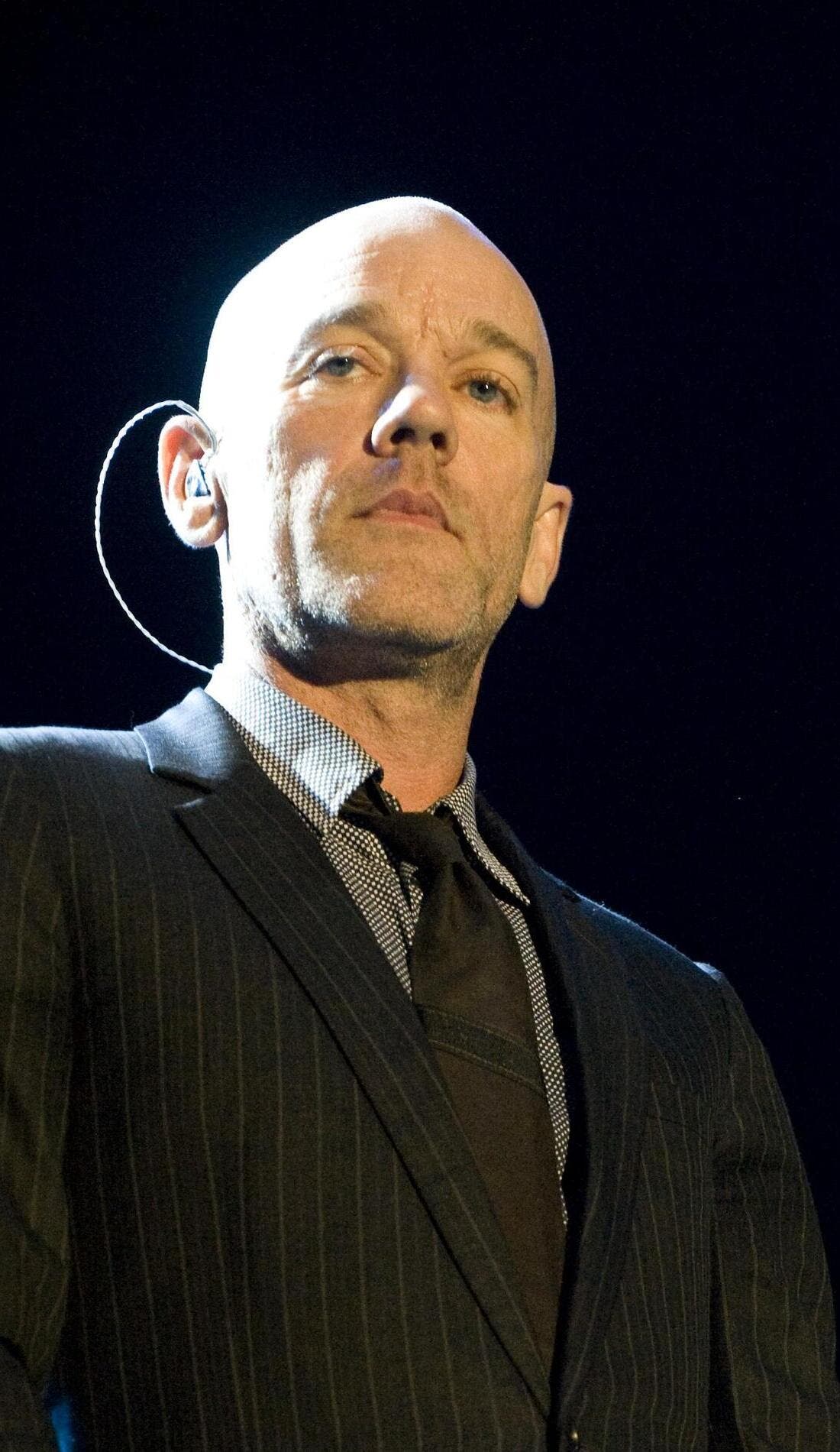 R.E.M. promotional image for upcoming events and ticket sales