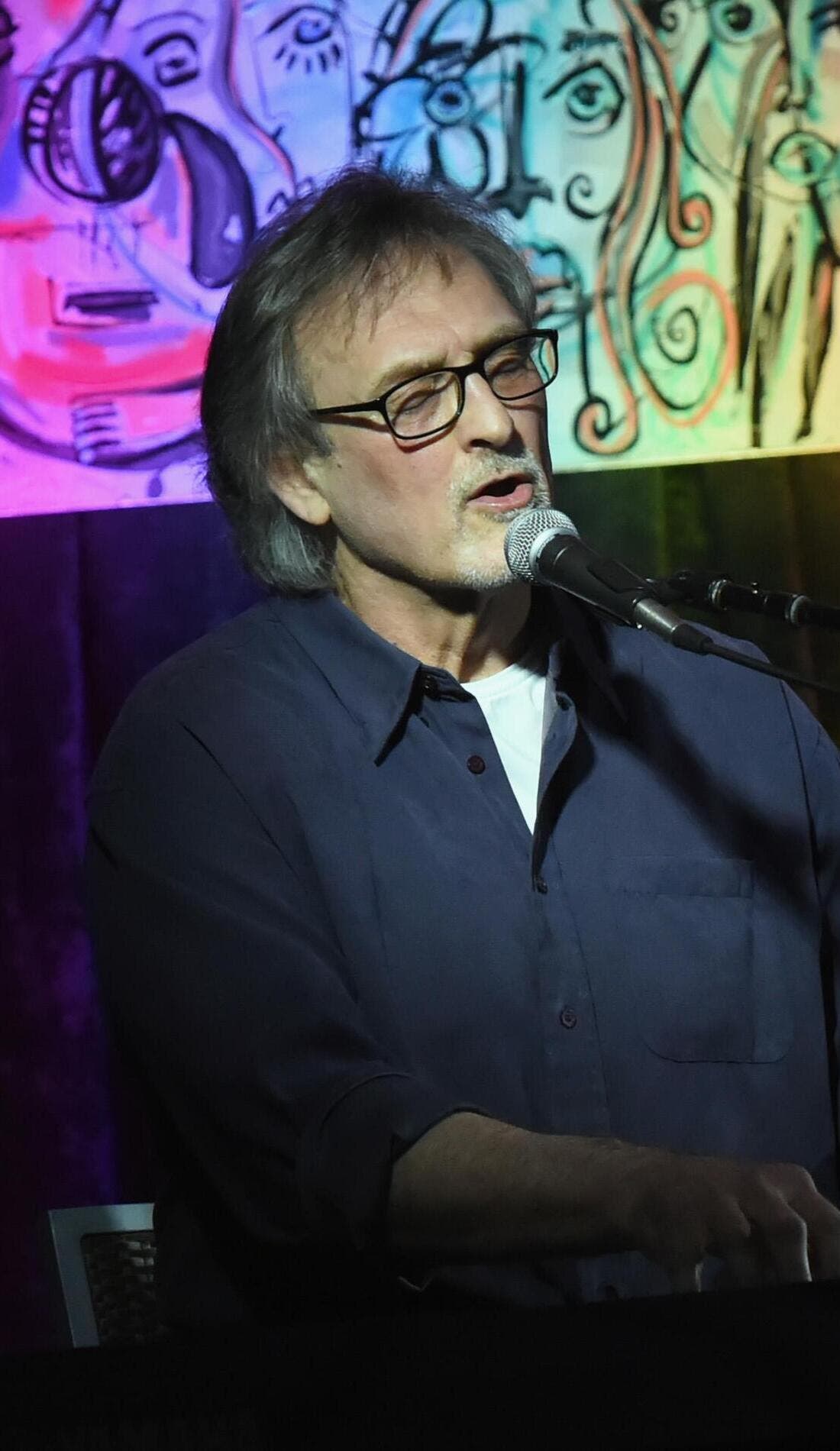 Reid promotional image for upcoming events and ticket sales