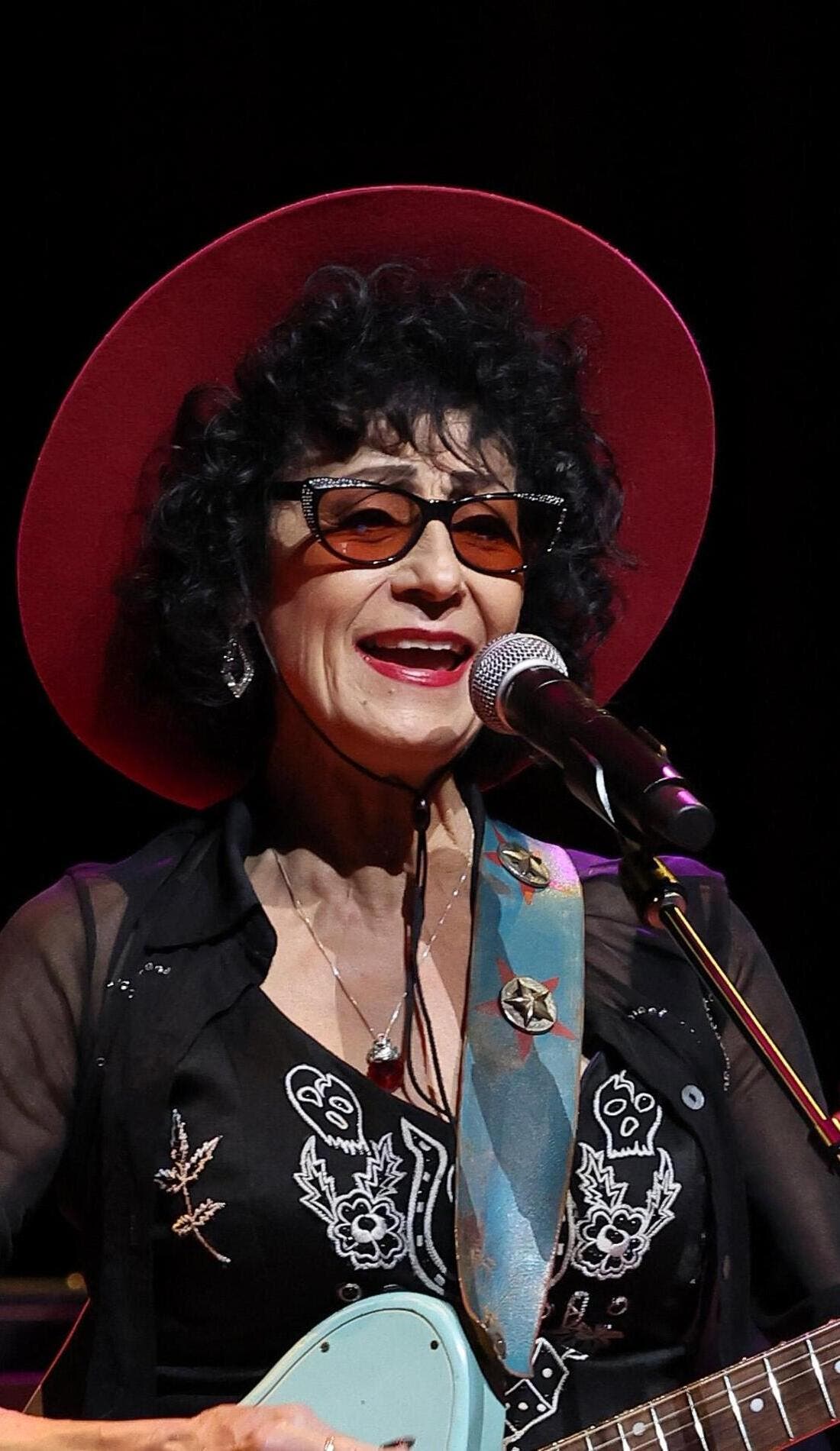 Promotional image for Rosie Flores parking