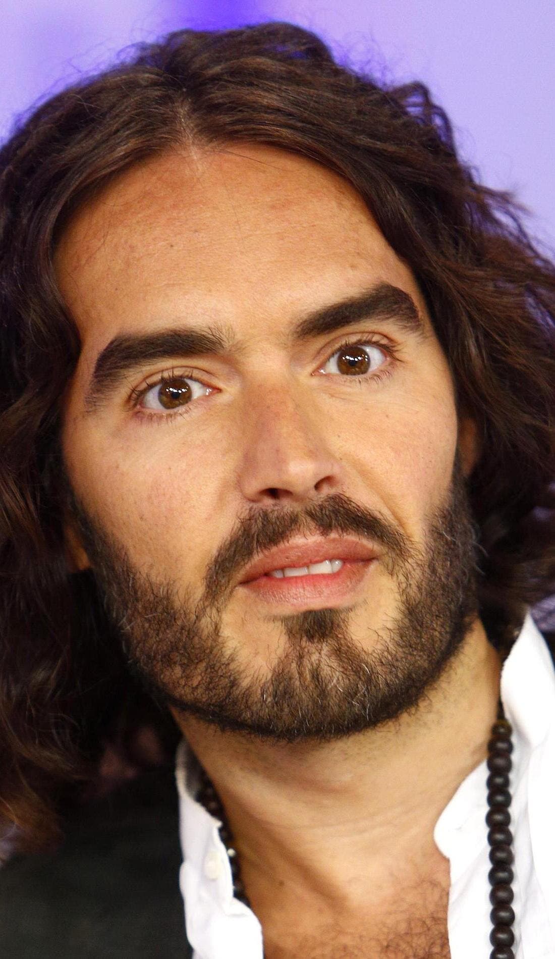 Russell Brand promotional image for upcoming events and ticket sales