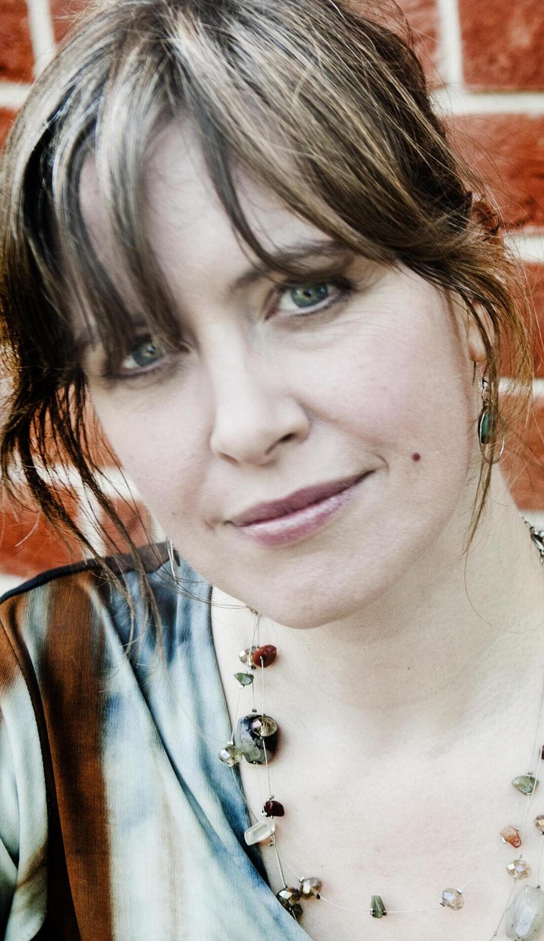 Sarah McQuaid promotional image for upcoming events and ticket sales