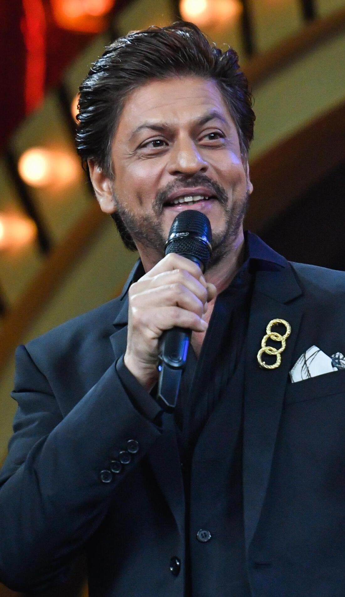 Shah Rukh Khan promotional image for upcoming events and ticket sales