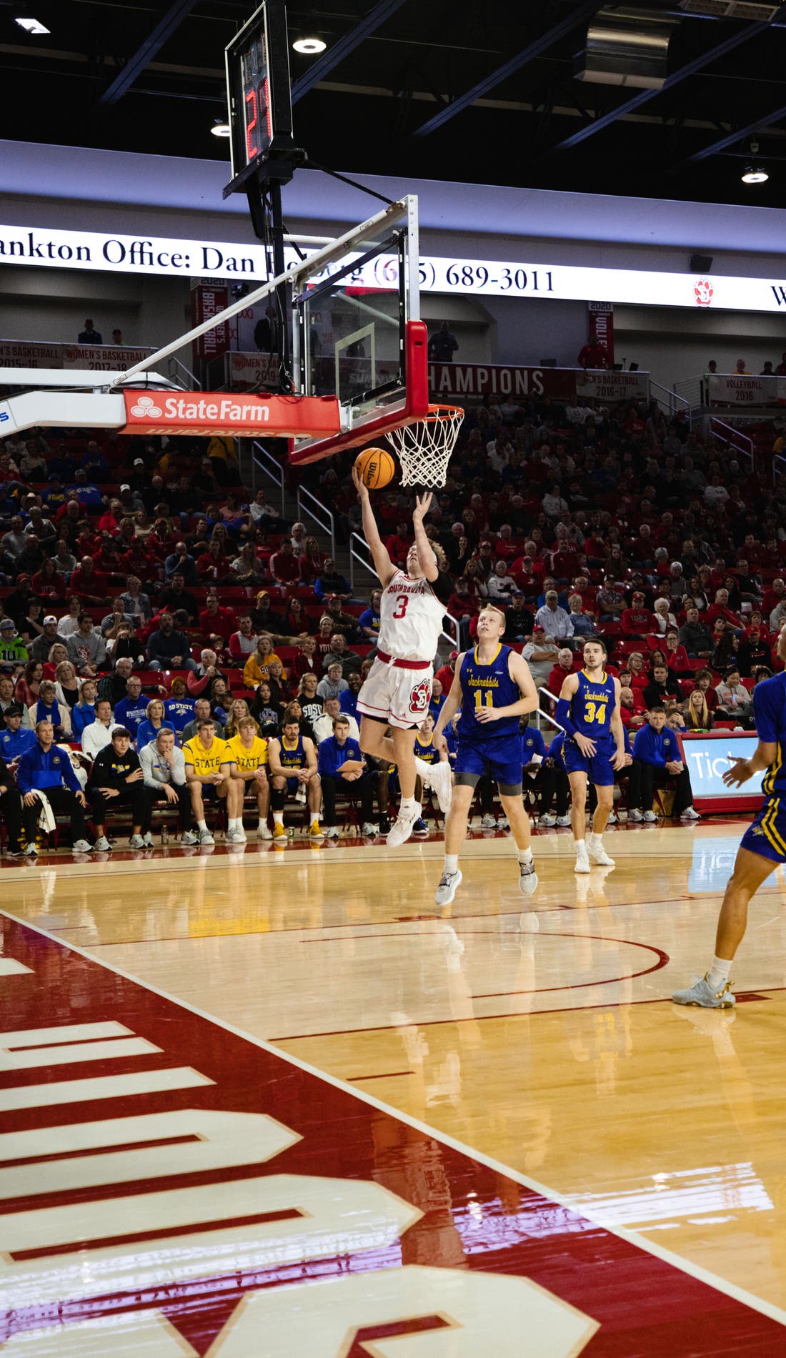 View from a seat at a South Dakota Coyotes Mens Basketball vs Omaha Mavericks Mens Basketball game, showing the teams playing