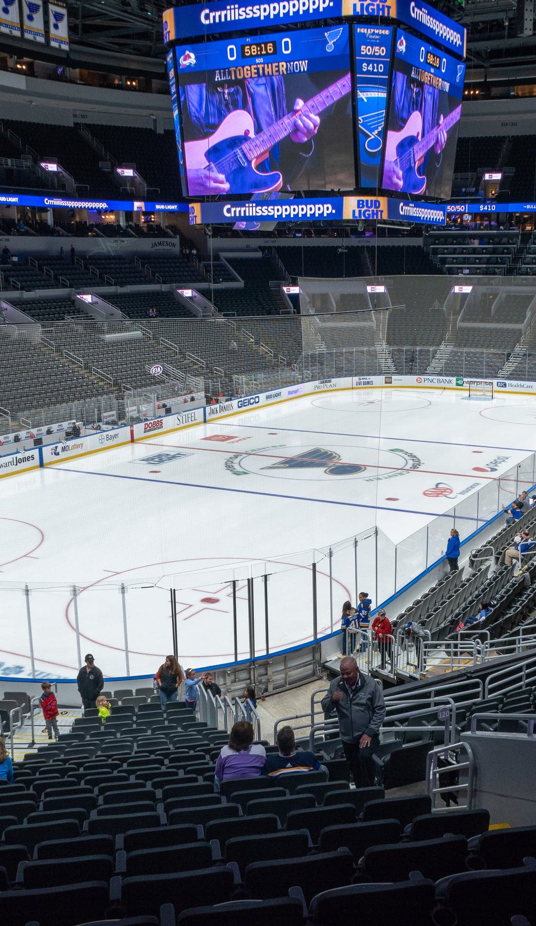 View from a seat at a St. Louis Blues vs Utah Mammoth game, showing the teams playing