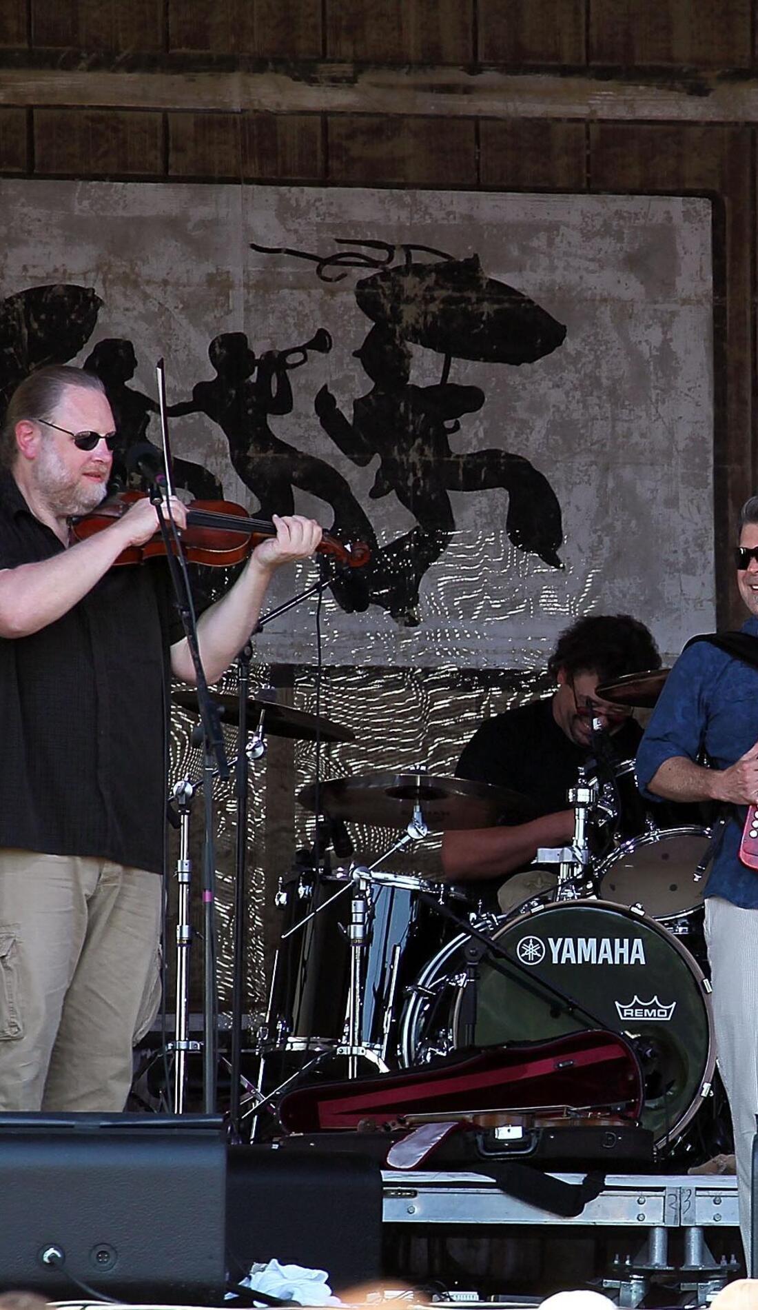 Steve Riley & the Mamou Playboys promotional image for upcoming events and ticket sales