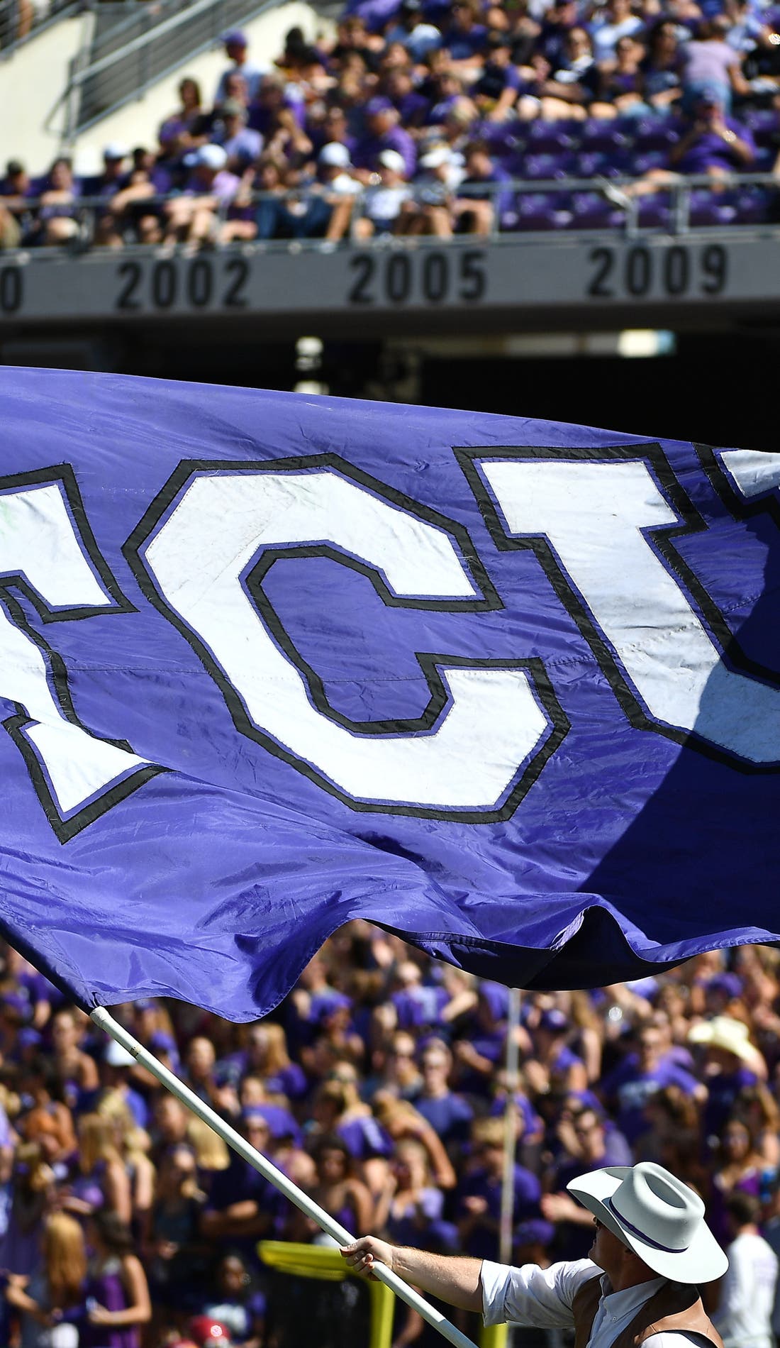 View from a seat at a TCU Horned Frogs Football vs LSU Tigers Football game, showing the teams playing
