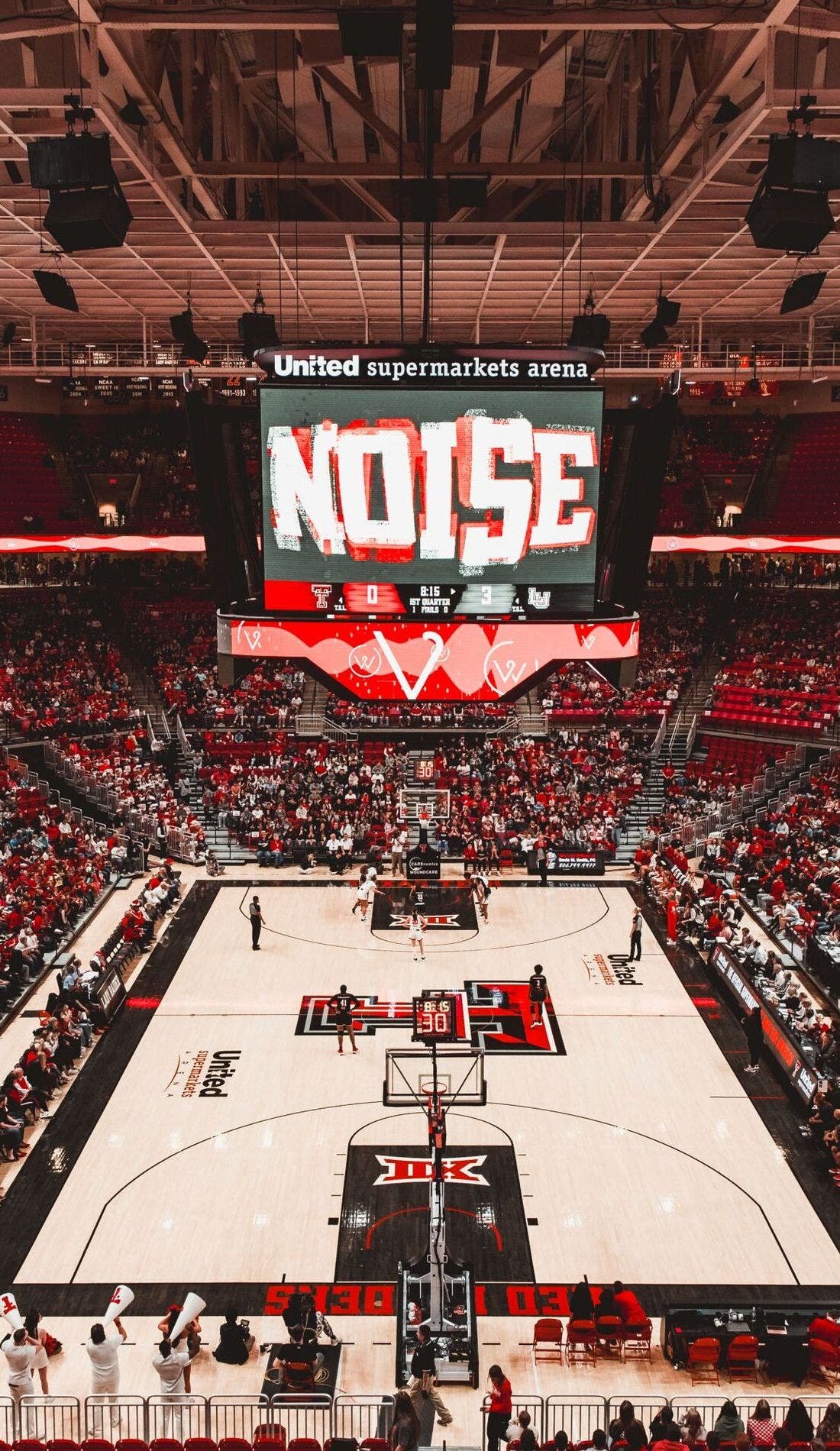 View from a seat at a Texas Tech Lady Raiders Womens Basketball vs TCU Horned Frogs Womens Basketball game, showing the teams playing