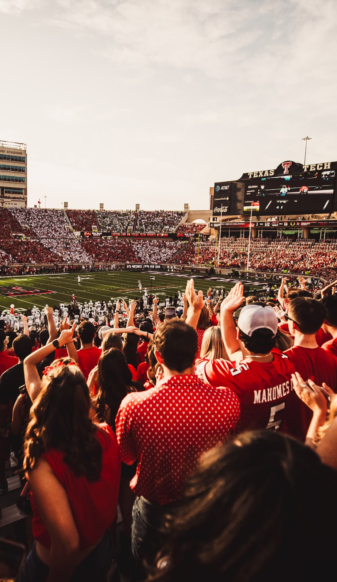 View from a seat at a Texas Tech Red Raiders Football vs BYU Cougars Football game, showing the teams playing