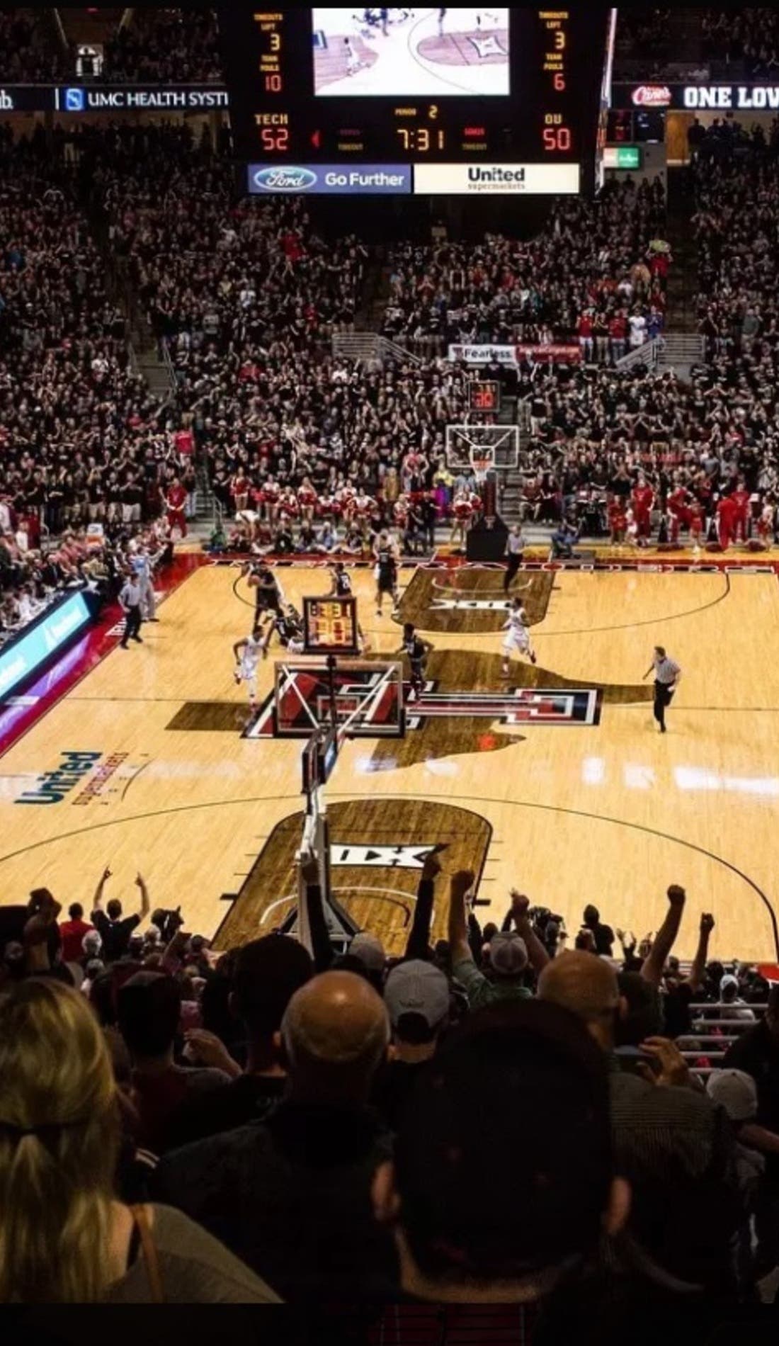 View from a seat at a Texas Tech Red Raiders Mens Basketball vs BYU Cougars Mens Basketball game, showing the teams playing