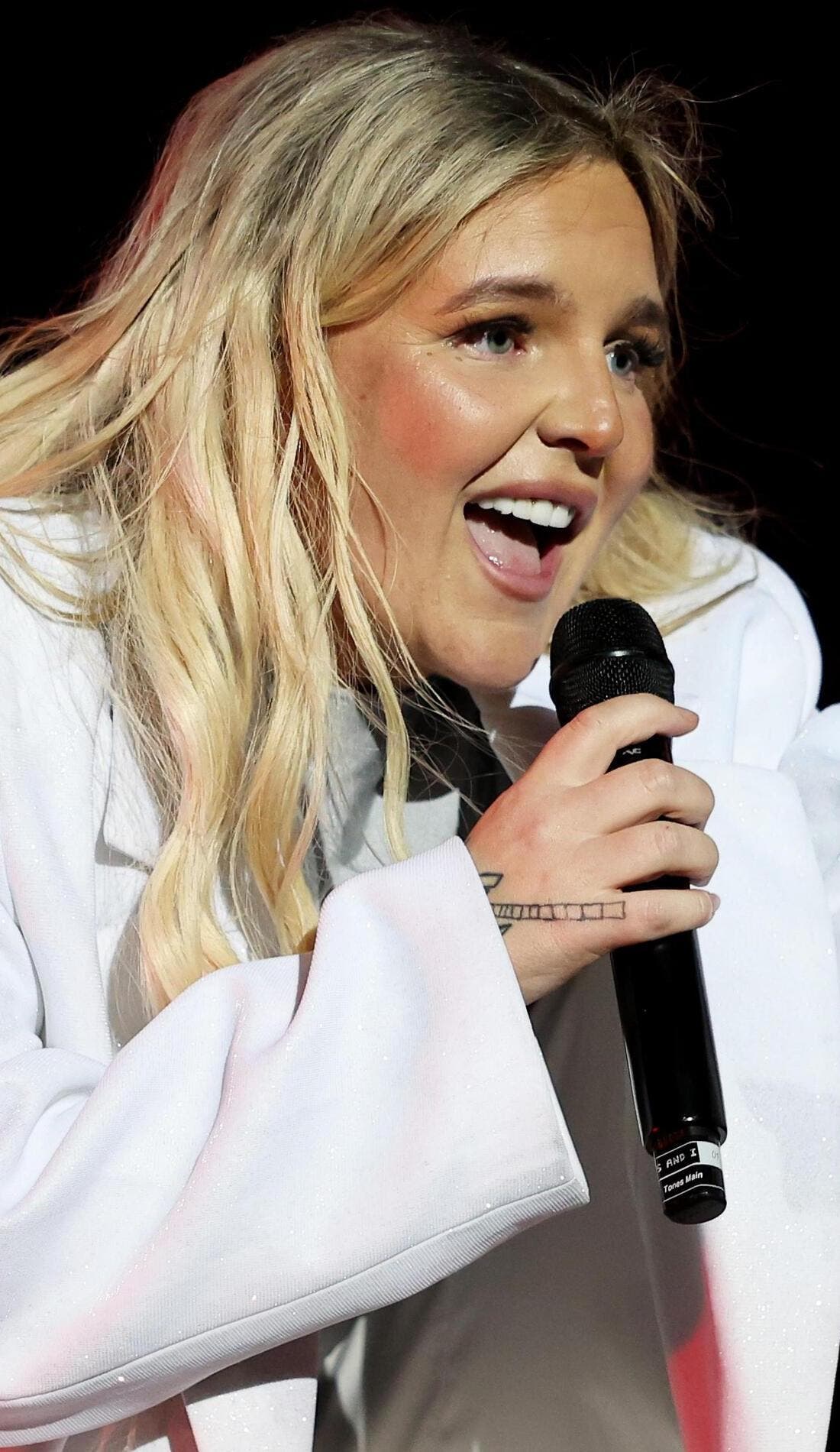 Tones And I promotional image for upcoming events and ticket sales