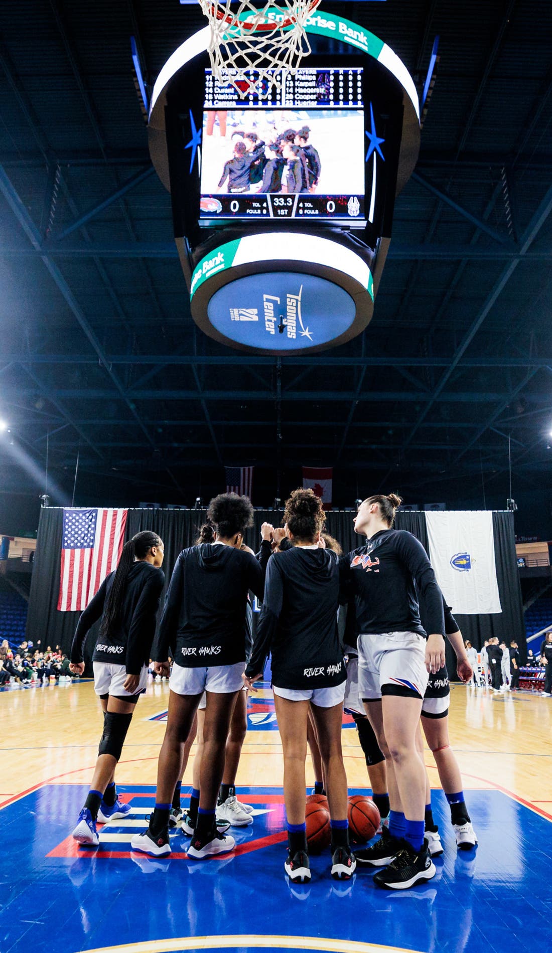 View from a seat at a UMass Lowell River Hawks Womens Basketball vs New Hampshire Wildcats Womens Basketball game, showing the teams playing