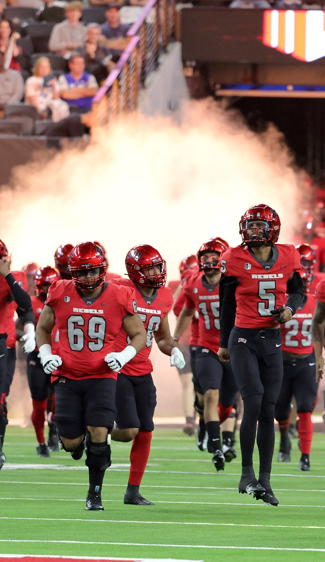 View from a seat at a UNLV Rebels Football vs Northern Colorado Bears Football game, showing the teams playing