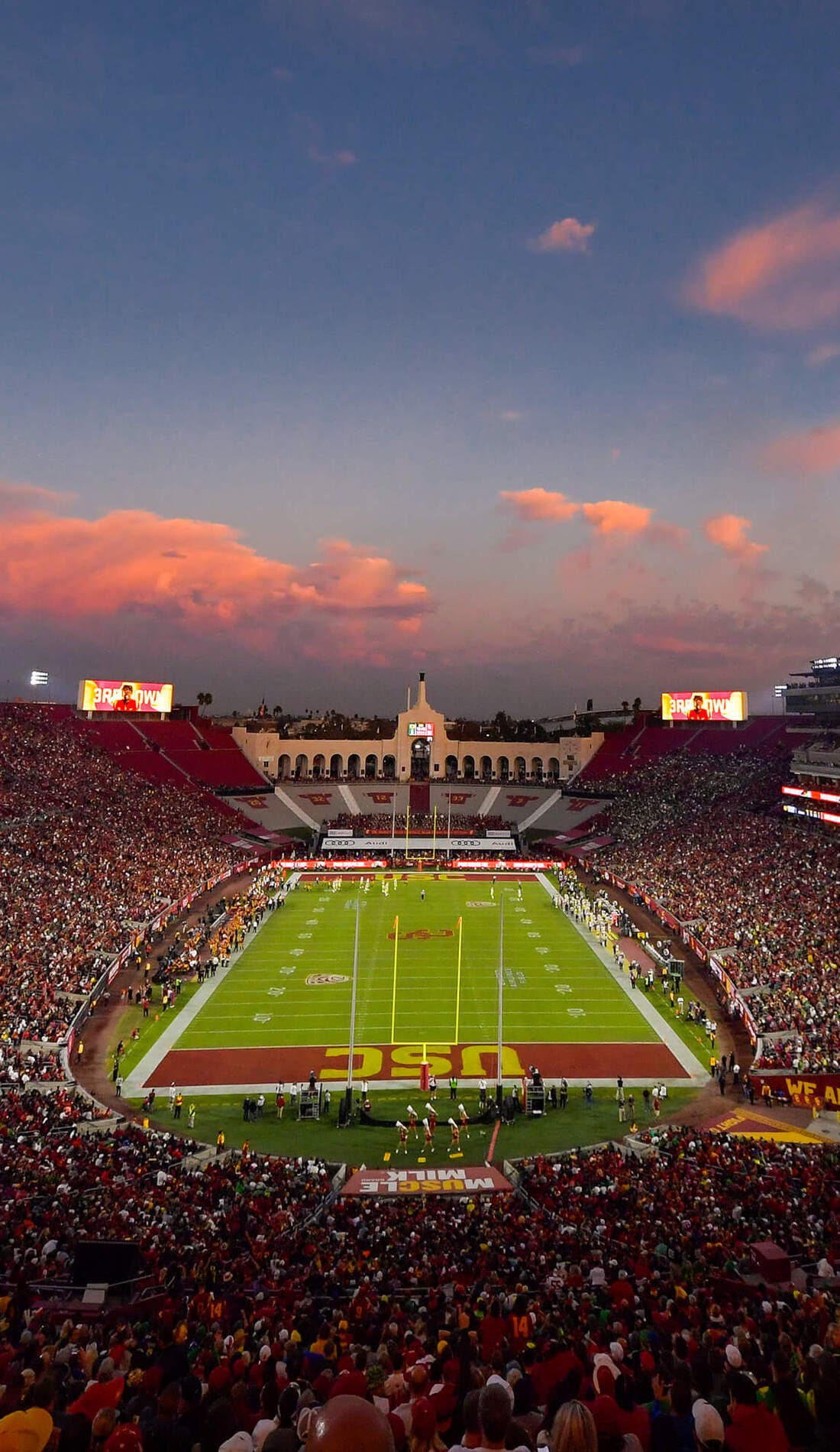 View from a seat at a USC Trojans Football vs Washington Huskies Football game, showing the teams playing