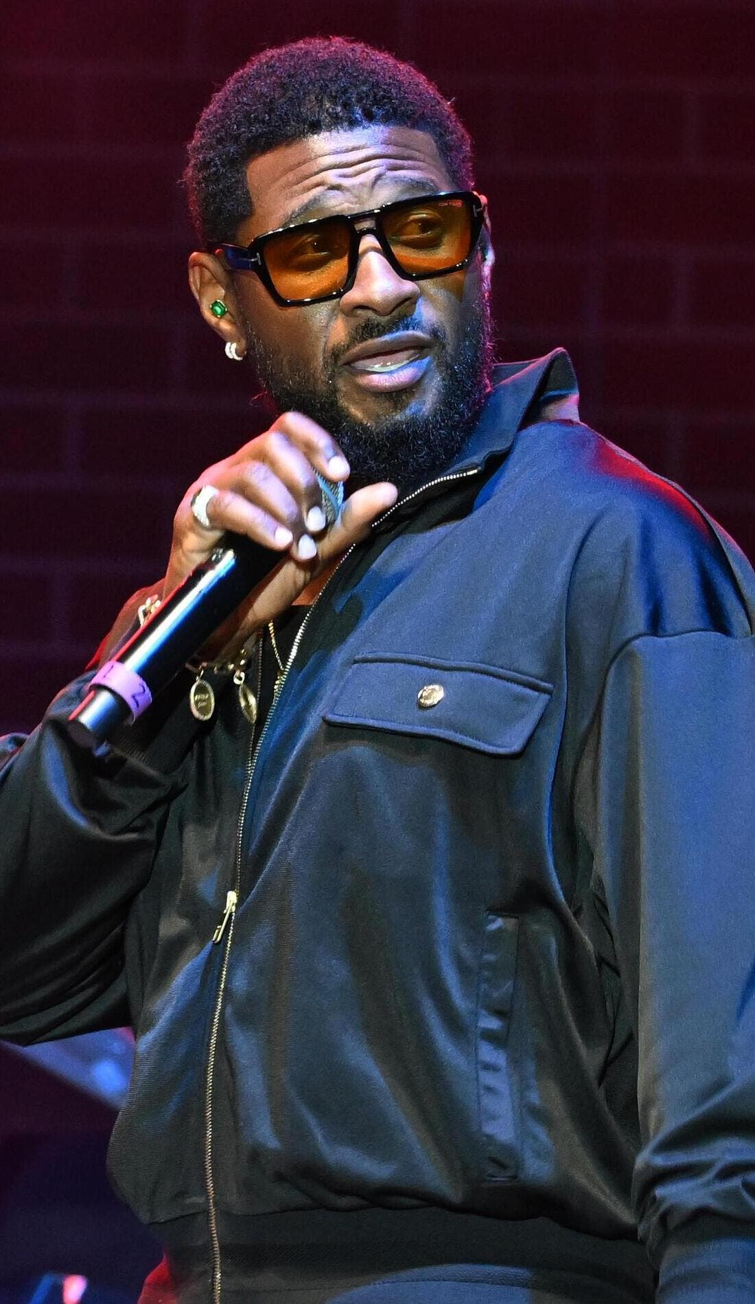 Usher promotional image for upcoming events and ticket sales in Phoenix