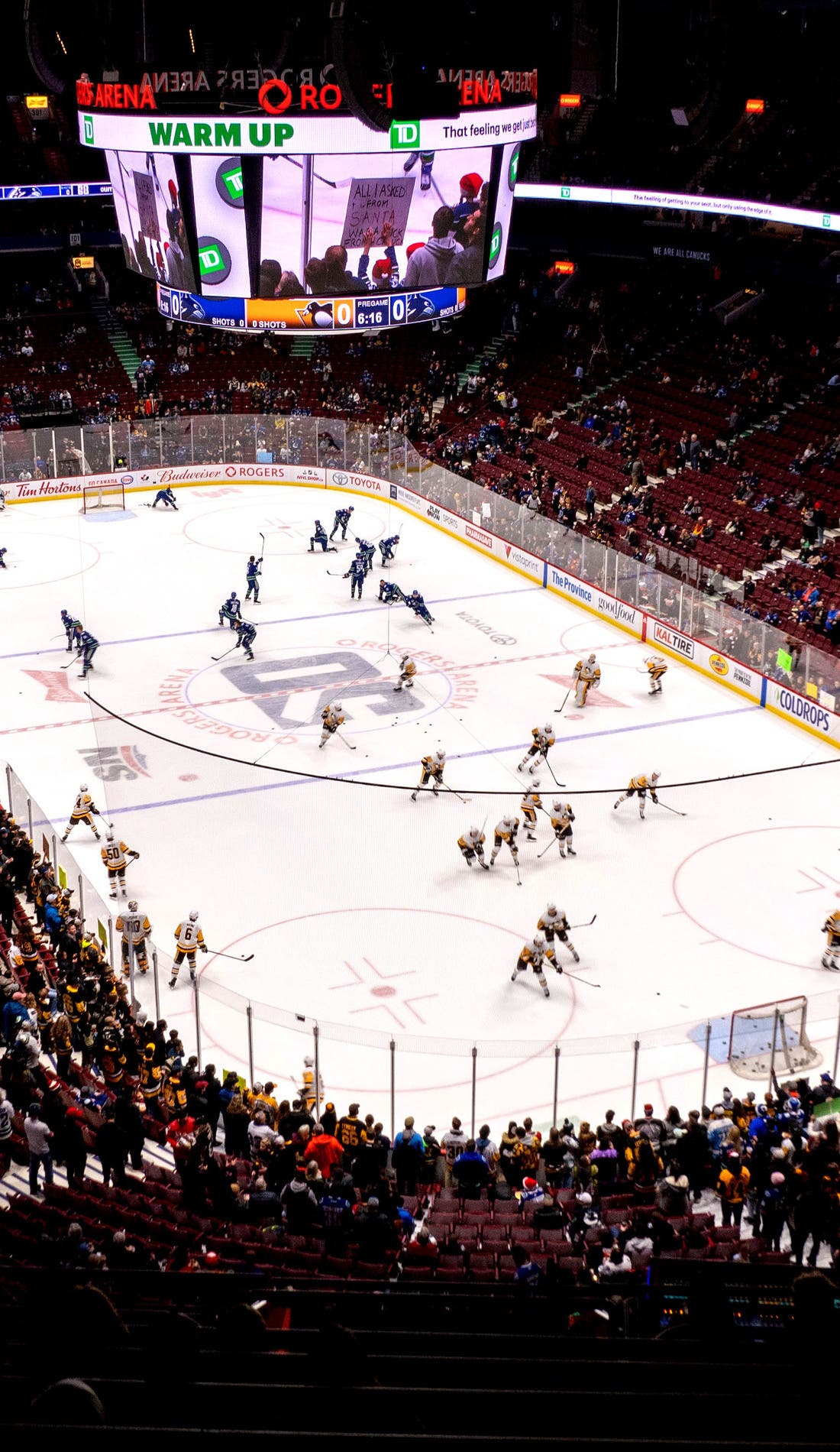 View from a seat at a Vancouver Canucks vs Anaheim Ducks game, showing the teams playing