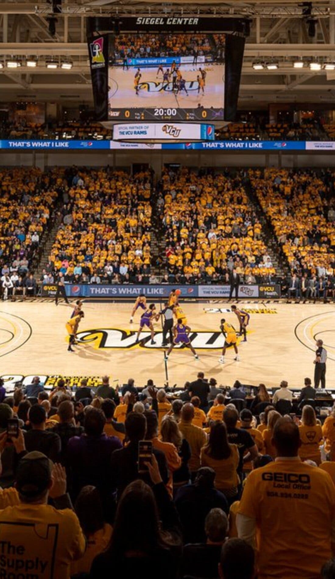 View from a seat at a VCU Rams Mens Basketball vs Hampton Pirates Mens Basketball game, showing the teams playing