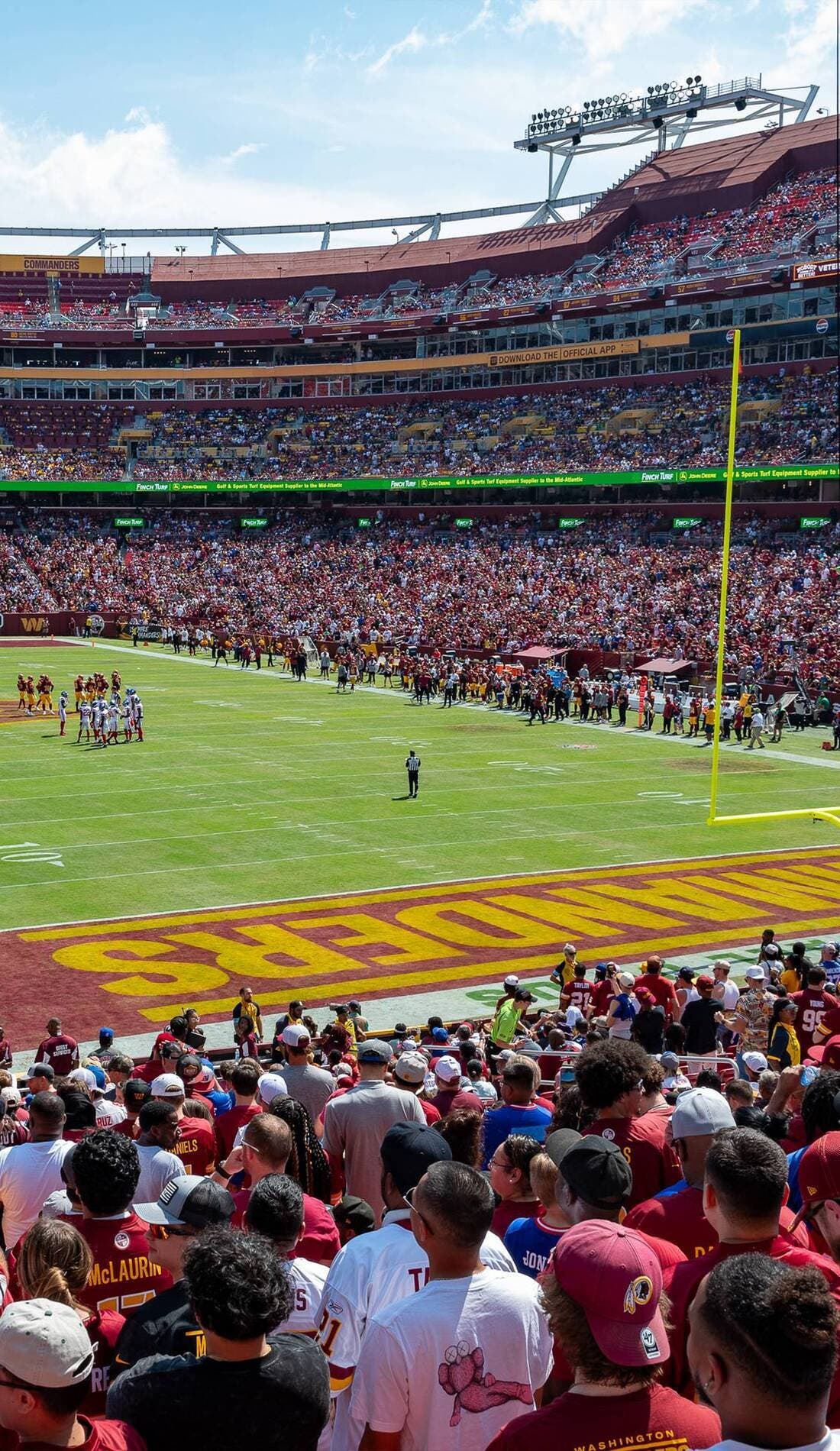 View from a seat at a Washington Commanders vs Green Bay Packers game, showing the teams playing