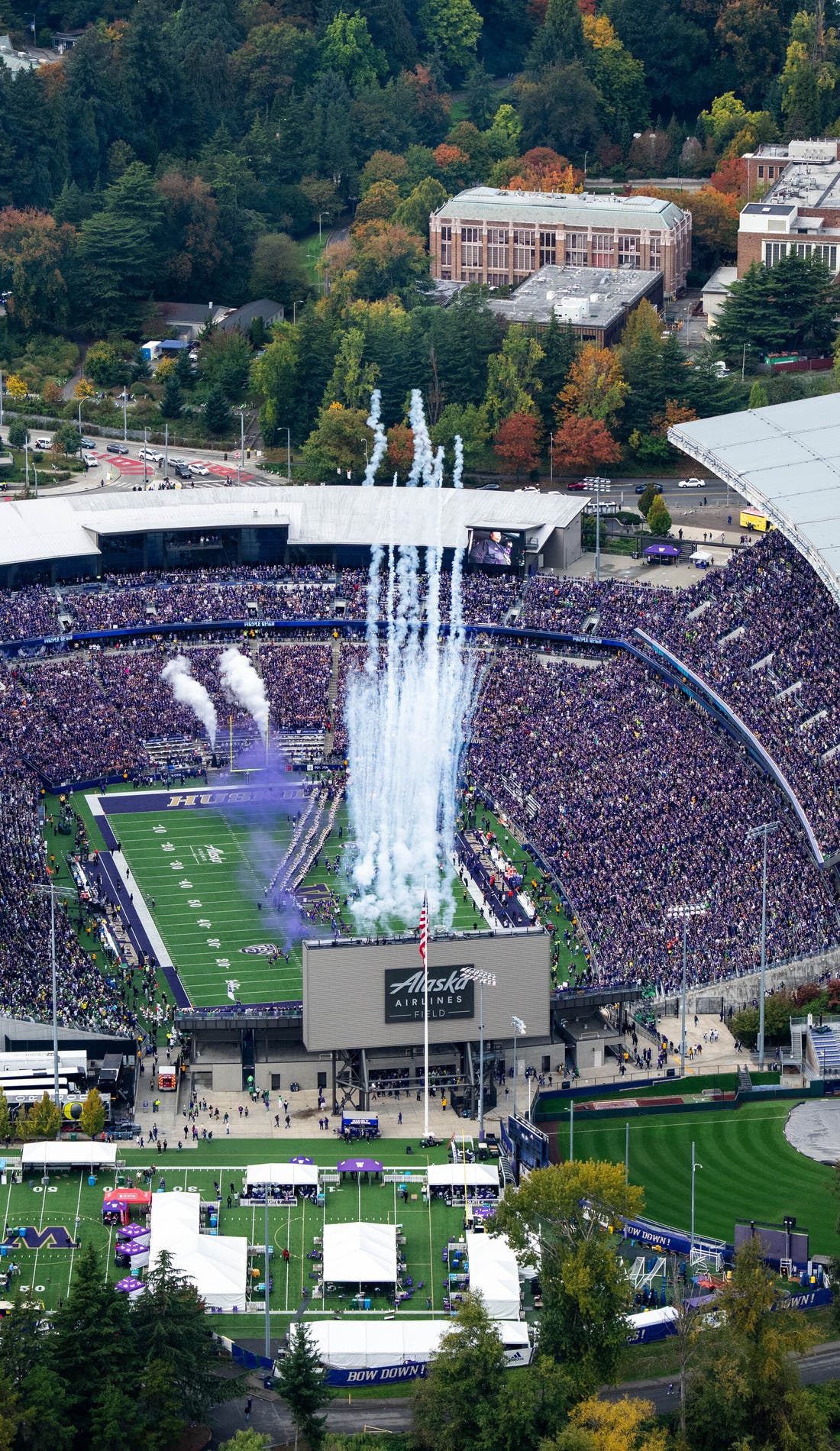 View from a seat at a Washington Huskies Football vs LSU Tigers Football game, showing the teams playing