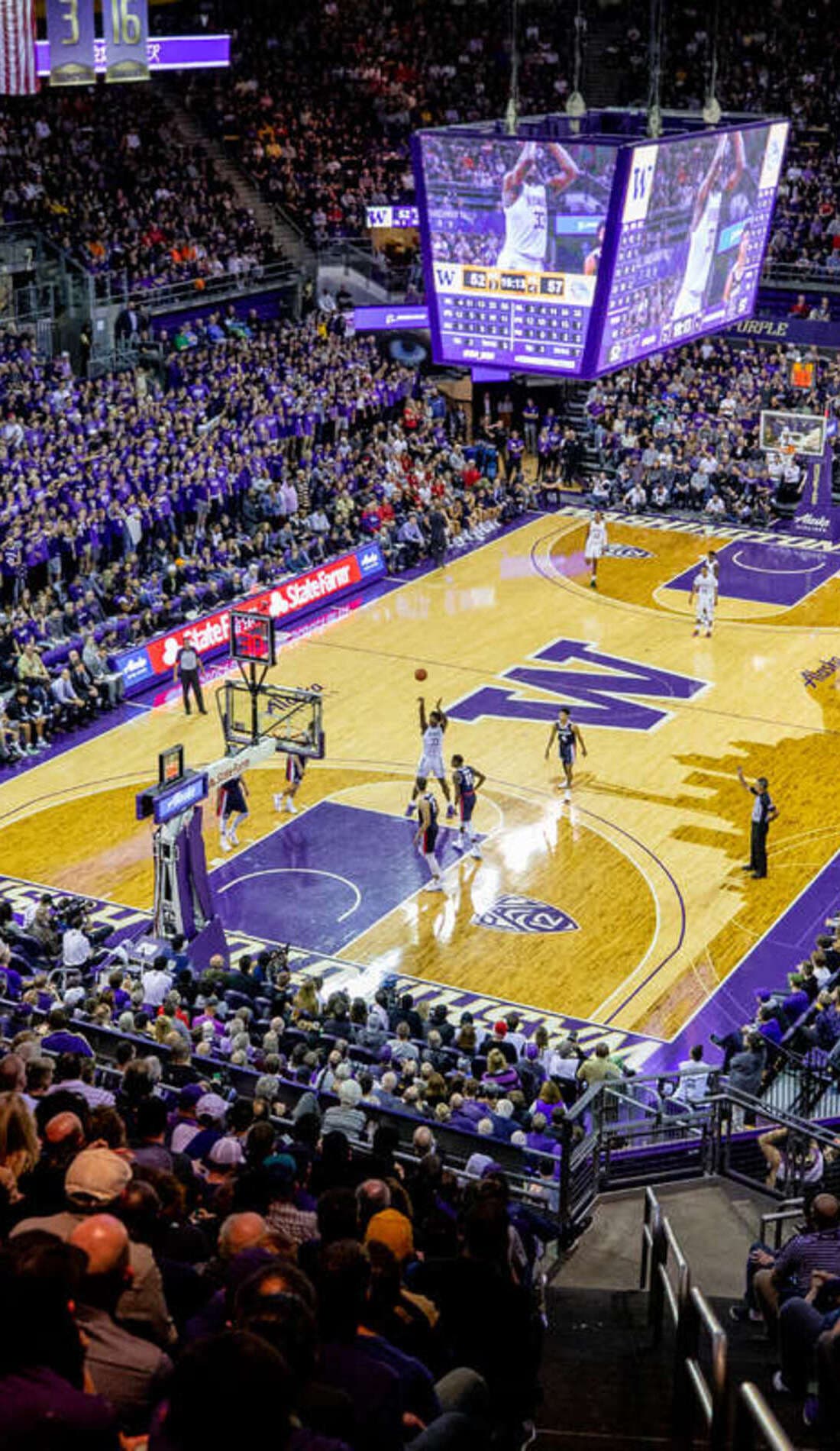 View from a seat at a Washington Huskies Mens Basketball vs Santa Clara Broncos Mens Basketball game, showing the teams playing
