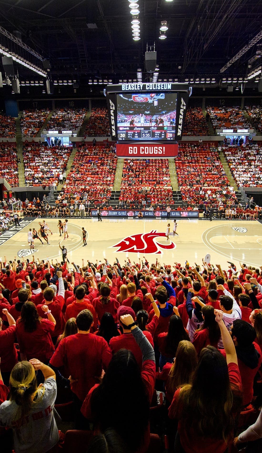 View from a seat at a Washington State Cougars Mens Basketball vs SIU Edwardsville Cougars Mens Basketball game, showing the teams playing