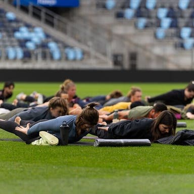 Promotional image of Yoga on the Pitch