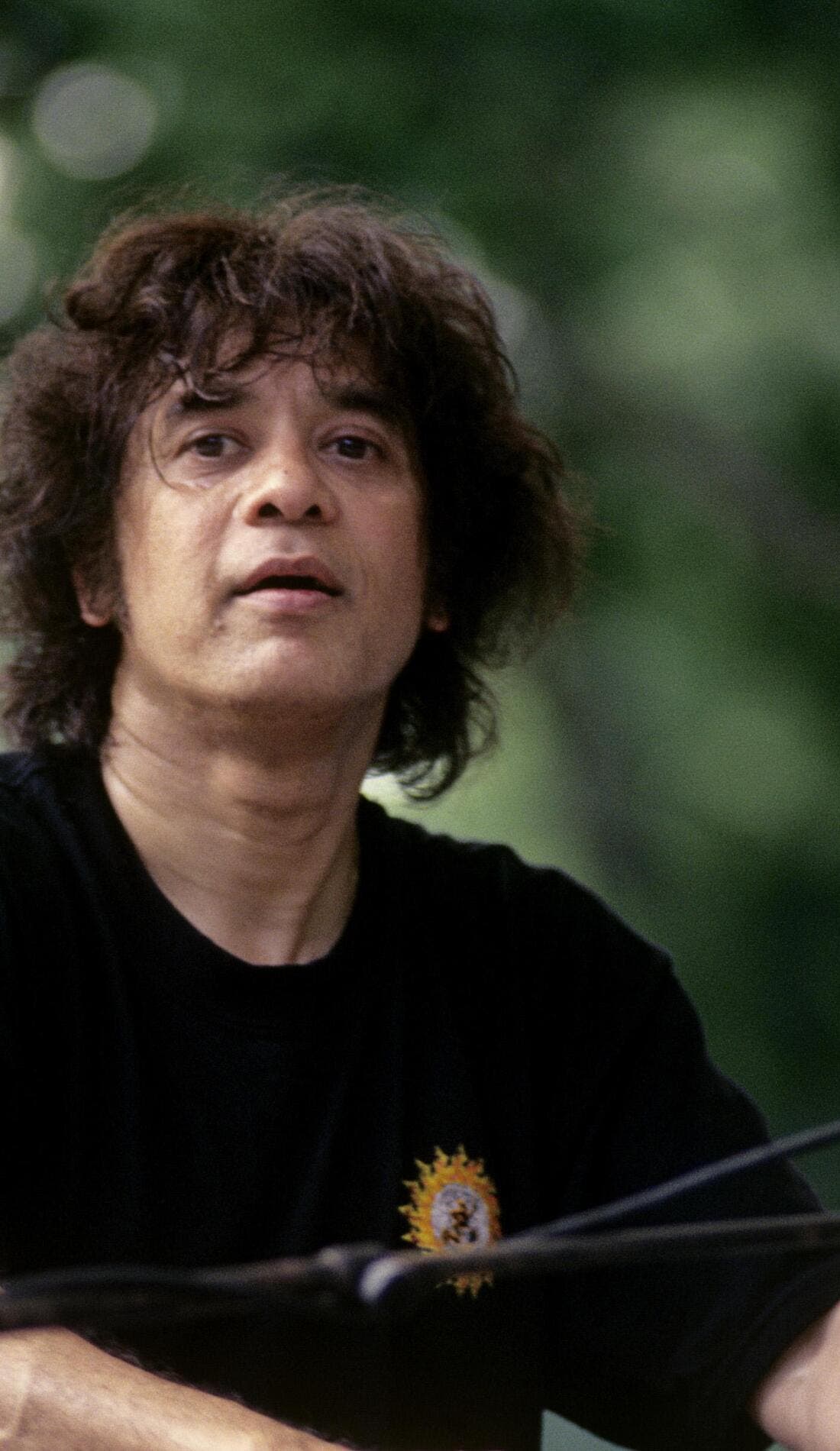 Zakir Hussain promotional image for upcoming events and ticket sales