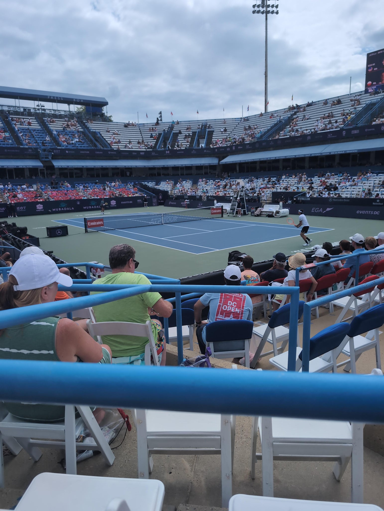 Real Fan View taken from Aisle 20 at Fitzgerald Tennis Stadium at Rock Creek Park Tennis Center by Trina H