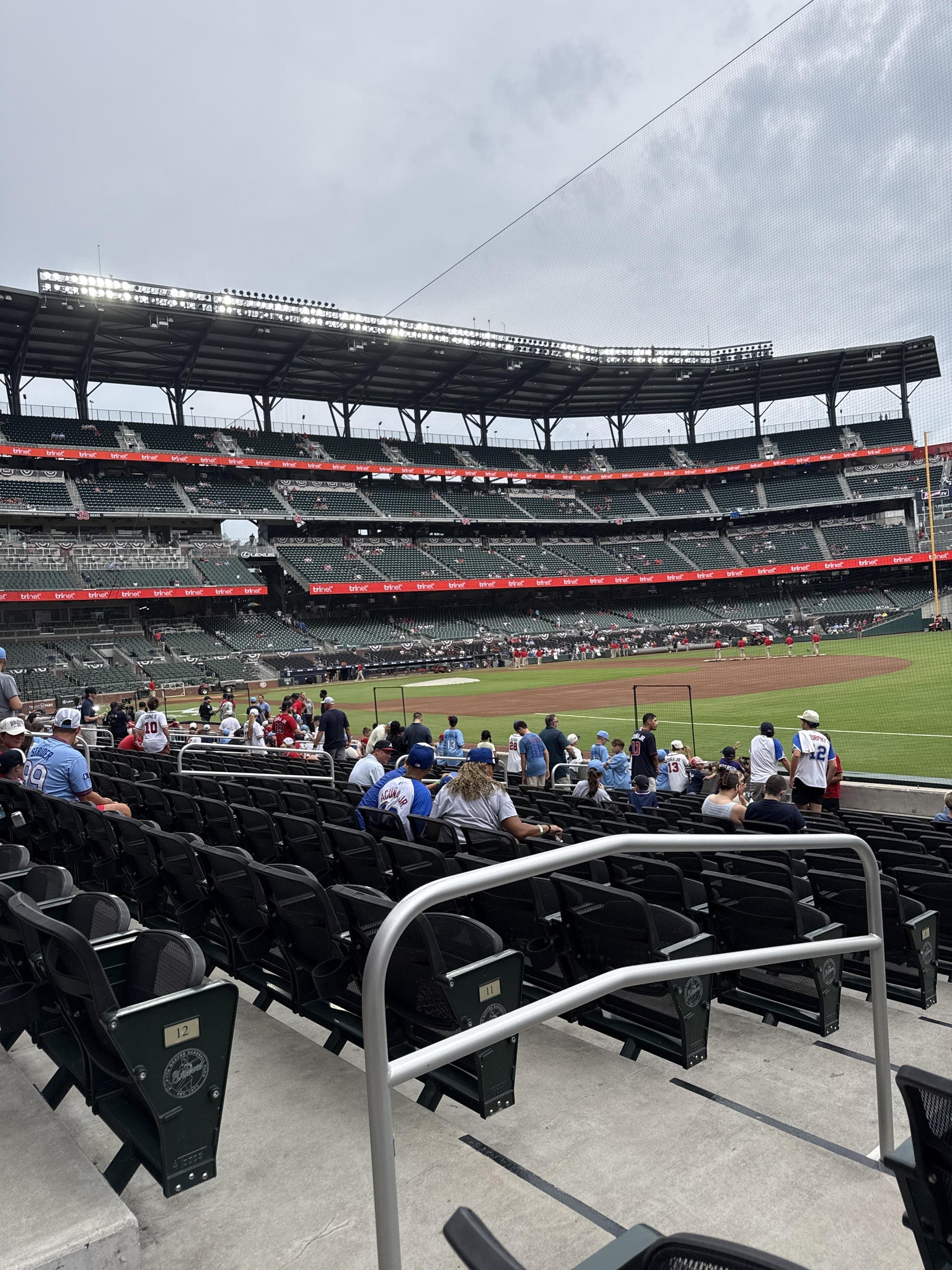 Real Fan View taken from Dugout Reserved 13 at Truist Park by Alyssa H